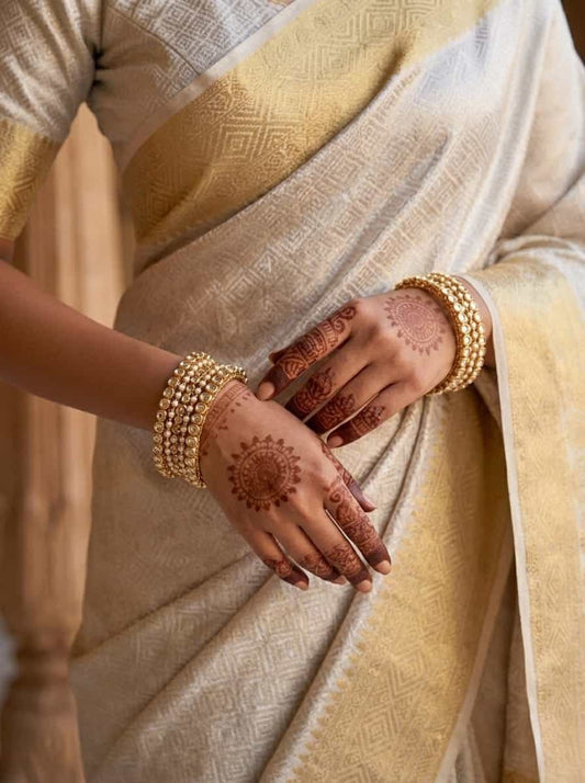 rriwaayat-iraaya-designer-back-blouse-antique-gold-saree